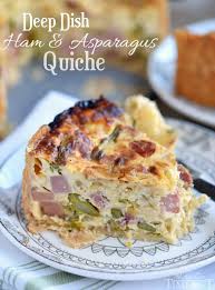 This Deep Dish Ham And Asparagus Quiche With Caramelized Onions Is The Perfect Addition To Your Ho Asparagus Quiche Quiche Recipes Berry French Toast Casserole