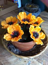 Fake Flowers Arranged In A Clay Pot Put In A Tan Basket Mix With Moss And Little River Rocks In The Moss Fall Pots Fake Flowers Flower Pots