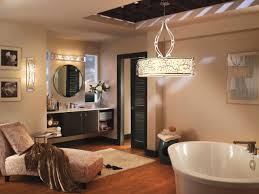 The modern, staggered brass chandelier in this example by interior designer lindye galloway is the perfect edgy touch for an elegant bathroom. Mesmerizing Smart Bathroom Lighting Ideas