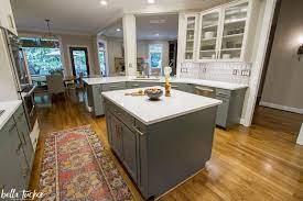 Worldly gray is a less intense, slightly more cool shade of gray. Upper Cabinets Worldly Gray Bella Tucker