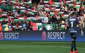 Celtic fans hold up palestine flags ahead of the champions league play off v hapoel be'er sheva (image: Scotland S Celtic Soccer Team Removes Palestinian Flags Displayed By Fans The Times Of Israel