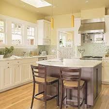 If you're too scared to commit to a yellow wall or charcoal cabinets, keep the space neutral and add these colors to the accessories. Traditional Kitchen Design Ideas Traditional Kitchen Design Yellow Kitchen Walls Kitchen Remodel Small