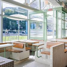 Silicus pink oblong coffee table. La Firme Transforms Cramped Space Into Montreal S Sun Lit Melk Cafe