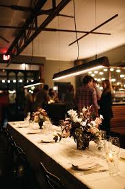 This Group Of Creatives Had The Chicest Dinner Party At An Italian Restaurant Italian Restaurant Decor Restaurant Table Setting Italian Restaurant