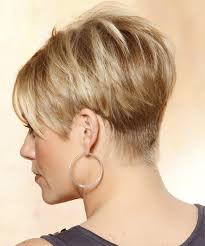 Beautiful straight but slightly wavy, soft and shiny caramel blonde hair with natural light blonde highlights resulting from sun exposure. Short Straight Caramel Blonde Hairstyle With Side Swept Bangs And Light Blonde Highlights