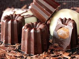 Canneles Chocolat Fourres Au Praline Recipe Pralines Confectionery Recipe Filling Recipes
