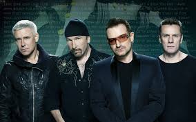 U2 are an irish rock band.the four members of the band are lead singer bono (born paul david hewson), lead guitarist the edge (born david howell evans), bassist adam clayton, and drummer larry mullen jr. U2 Band Members Look Hd Wallpaper Wallpaper Flare