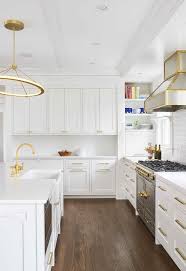 How To Design A Luxurious White And Gold Kitchen Gold Kitchen Kitchen Flooring White Kitchen Design