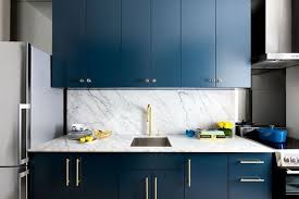 Similar cabinet color, cabinet hardware, and counter color. Blue Kitchen Cabinets Eye Catching Designs In A Variety Of Styles