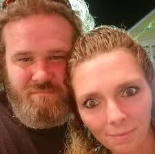 This is my wife and me. Im proud of her. We've been through alot together.  The lord has saved our marriage and put us