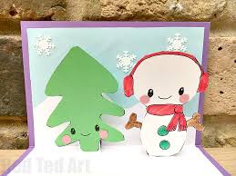With the folded side facing you, cut two 1.5 inch slits. Easy Snowman Pop Up Card Red Ted Art Make Crafting With Kids Easy Fun
