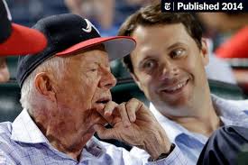 Grandson Proudly Squirms in Carter's Footsteps