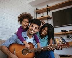 Image of Family playing music together