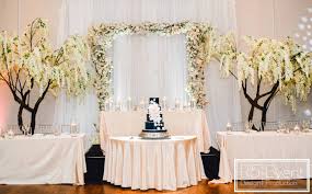 Head Table Decor With A Cherry Blossom Archway Runner Of Candles And Tall White Wisteria Trees By R5 Event Design Head Table Decor Design Event Design