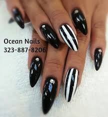 Black And White Striped Nails Halloween The Black And White Stripes Nail Art Striped Nails White Nail Designs White Acrylic Nails