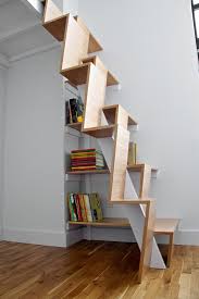 A compact ladder and a trapdoor designed in minimalist style provide access to the attic. 35 Really Cool Space Saving Staircase Designs Digsdigs