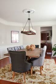 I did the revere pewter in my dining room against the white bottom and trim and it looks gorgeous but would have been too dark all over my house. Benjamin Moore Revere Pewter In Real Houses How To Nest For Less