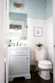 Ladder shelf behind the toilet is a smart storage solution for small powder room. Beautiful Half Bath Powder Room Decorating Ideas Abby Lawson