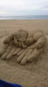 He S Got The Whole World In His Hands Beautiful Sand Art Sand Sculptures Amazing Art Sand Art
