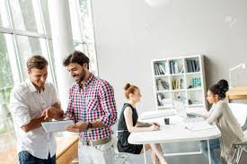 Unfortunately, we've grown accustomed to seeing cheesy stock images of people in suits shaking hands. Young People In The Office Stock Photo Picture And Royalty Free Image Image 33694414