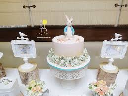 I love all of the beautiful floral arrangements in it; Peter Rabbit Baby Shower Bonito Design Events