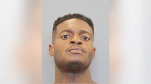 Houston murder suspect found sleeping