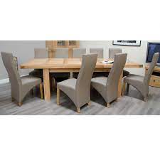 To fit in more guests, the table uses a butterfly leaf. Bordeaux Oak Extending Dining Table 6 10 Seat Set Only Oak Furniture