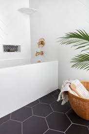 Black And White Ceramic Tile For Bathroom Floor Designing With Black And White Tile The Tile Shop Blog In 2020 White Bathroom Tiles Bathroom Tile Designs Tile Bathroom