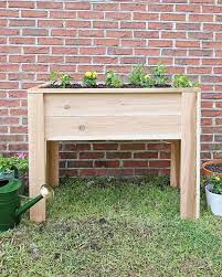Raised garden bed design ideas. How To Build A Raised Garden Bed With Legs Angela Marie Made