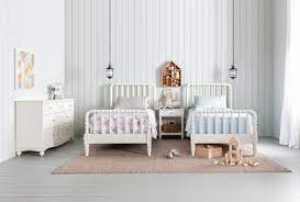 It's a bed frame that fits standard us twin mattress, but thanks to the spindle back board and arm rests, this solid wood frame also looks and functions like a sofa. Madison White Twin Spindle Panel Bed Living Spaces
