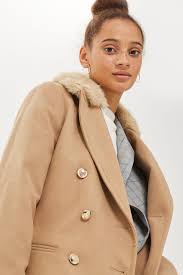 Check out our camel wool coat selection for the very best in unique or custom, handmade pieces from our clothing shops. Faux Fur Collar Coat Shopperboard