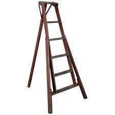 Vintage american wood and metal riveted folding orchard harvest fruit picking ladder in nicely aged old pale surface to wood with some scattered areas of old paint. 1940 Wooden Orchard Ladder In Old Paint At 1stdibs