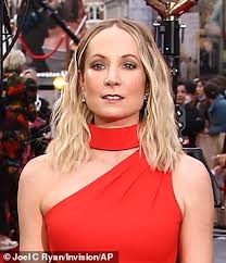 Joanne Froggatt cuts a glamorous figure in a red gown at Downton Abbey 2  premiere