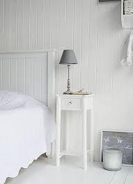 A Narrow Tall White Bedside Table With Drawer And Silver Handle New England White Bedroom Furniture White Bedside Table Narrow White Bedside Table Skinny Bedside Table