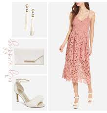 This modern style with an asymmetrical hem and pretty ruched high next is a nice light and dressy fabric for august weddings. Pin On Wedding Guest