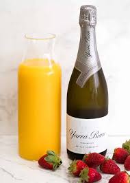 How To Make Mimosas Champagne Cocktail Recipetin Eats Top with champagne and garnish with pineapple and/or cherry.
