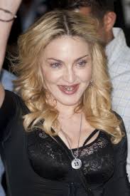 Madonna grilled on her odd teeth accessory. Can Someone Please Explain Madonna S Grill Situation Why Is She Wearing This Thing On Her Teeth Glamour