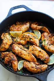 Boneless Skinless Chicken Tender Recipes With Chicken Tenders And Garlic Butter On Skillet In 2020 Chicken Tenderloin Recipes Chicken Tender Recipes Chicken Recipes
