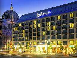 The Radisson Blu Hotel S 82 Foot Aquadom Aquarium Brings Sea Life And Scuba Diving To Berlin Berlin Hotel Europe Hotels Hotel