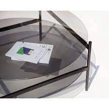 This glass coffee table provides a design that would be a stunning centre piece for any living space. Duotone Coffee Table Round Black Smoked Glass Rouse Home