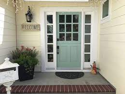 Love the new more subtle aqua color on our interior. Door Benjamin Moore Wythe Blue Siding Sherwin Williams Summer White Exterior House Paint Color Combinations House Paint Exterior Exterior House Colors