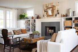 This is an example of a large country open plan living room in cornwall with white walls and beige floors. 22 Cozy Country Living Room Designs