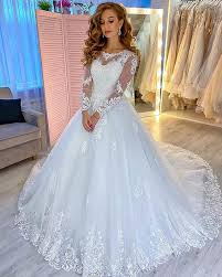A lace wedding dress with sleeves will also help display the beauty and intricacy of the lace pattern itself. Princess Lace Long Sleeve Wedding Dress Elegant White Bridal Gown With Train Kprom Online Store Powered By Storenvy