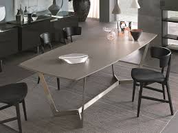 The bed features a tall headrest with vertical silver accents in the middle and a recessed mattress frame featuring wood orthopedic slats for mattress ventilation. Lacquered Wooden Table Virgo Atelier Collection By Misuraemme Design Mauro Lipparini Dining Table Design Apartment Dining Room Dining Table