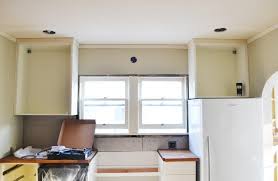 Hanging Kitchen Cabinets On Uneven Walls Hanging Kitchen Cabinets Kitchen Cabinets Installing Kitchen Cabinets
