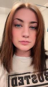 Where can I get my black hair stripped to achieve silver hair?