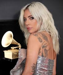 Lady gaga's new rose tattoo is a tribute to a star is born, where she sang la vie en rose to bradley cooper. Lady Gaga S New Tattoo Pays Tribute To A Major Milestone Instyle
