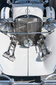 Radiotor And Headlights Of A Classic White Excalibur Convertible Sports Car Stoc Affiliate White Excalibur Classic Classic White Sports Car Classic