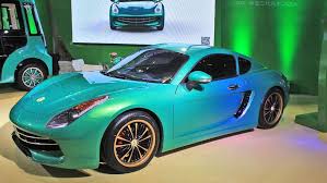 Nicht immer ganz alleine, aber was sich auf. Vorne Ferrari California Hinten Porsche Cayman Der Eagle Carrie Autohersteller Autos Chinesisch