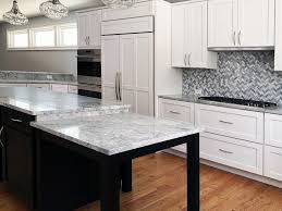 White cabinets and dark blue tiling, or dark blue kitchen cabinets topped with a beautiful pale marble will make for a bright and airy kitchen cabinet design. Create A Modern Kitchen With Dark Kitchen Cabinets Interior Projects